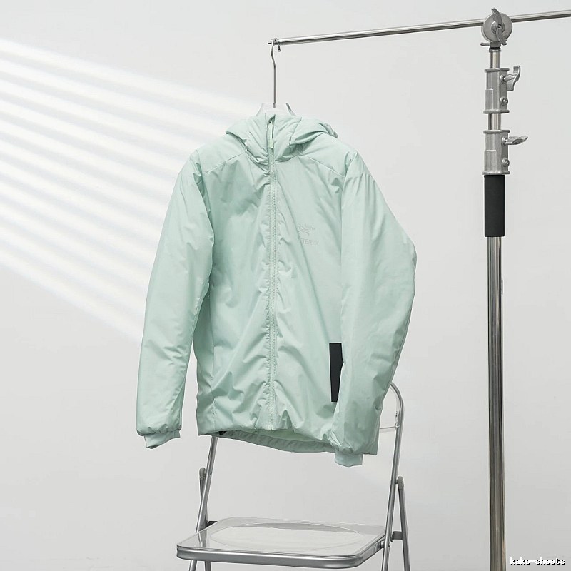 Clean Hooded Profile And Minimal Chest Branding Arc'teryx Lightweight Shell Jacket in Mint Green