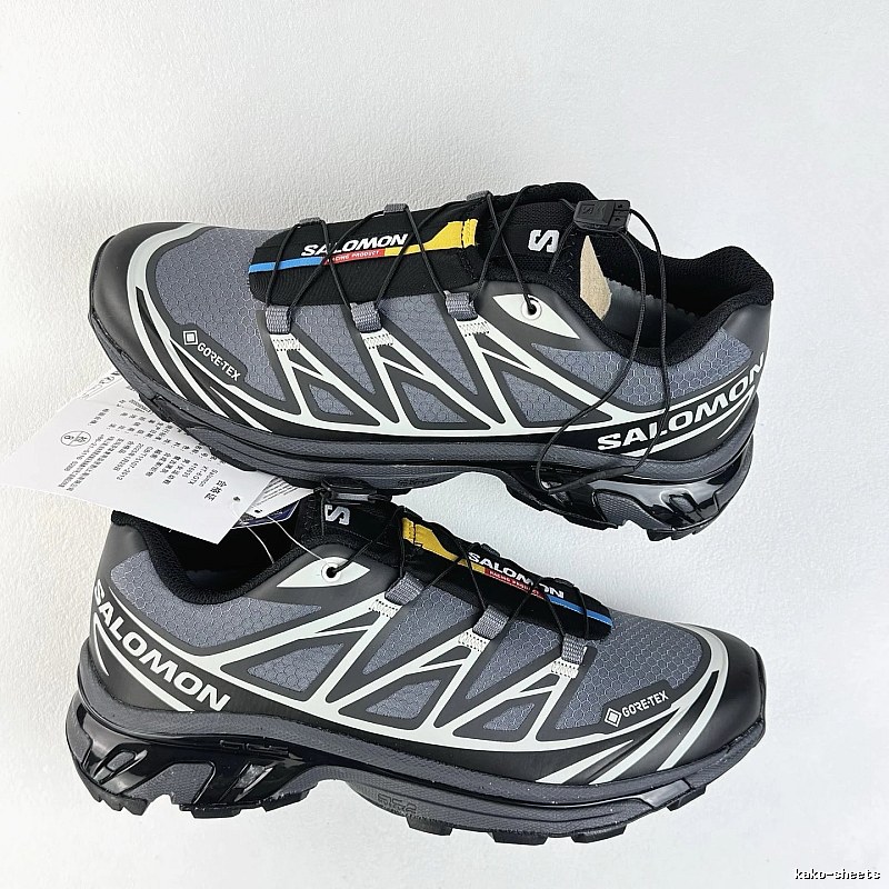 Salomon Black and Gray Trail Sneakers Defined by Treaded Trail Sole