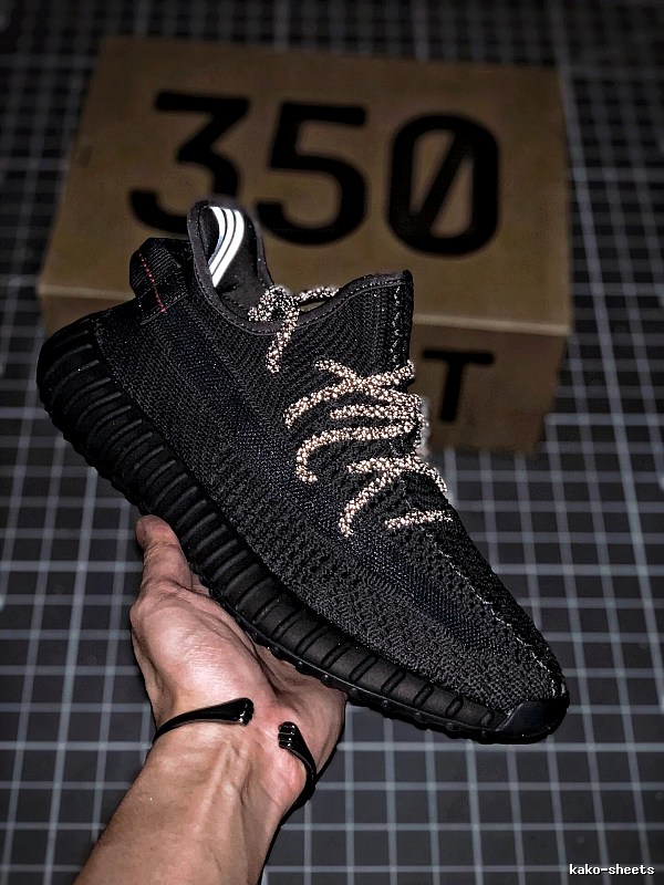 Yeezy Black Knit Sneakers Defined by Sock-Like Collar